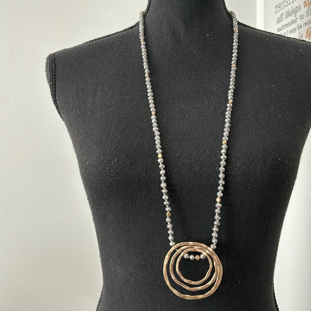 Gray beaded necklace with gold accent
